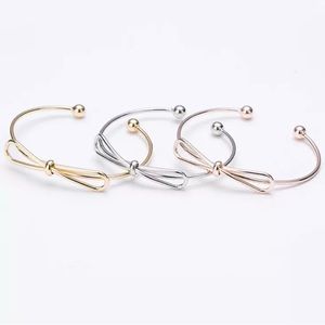Loose bow bracelet/ bangles